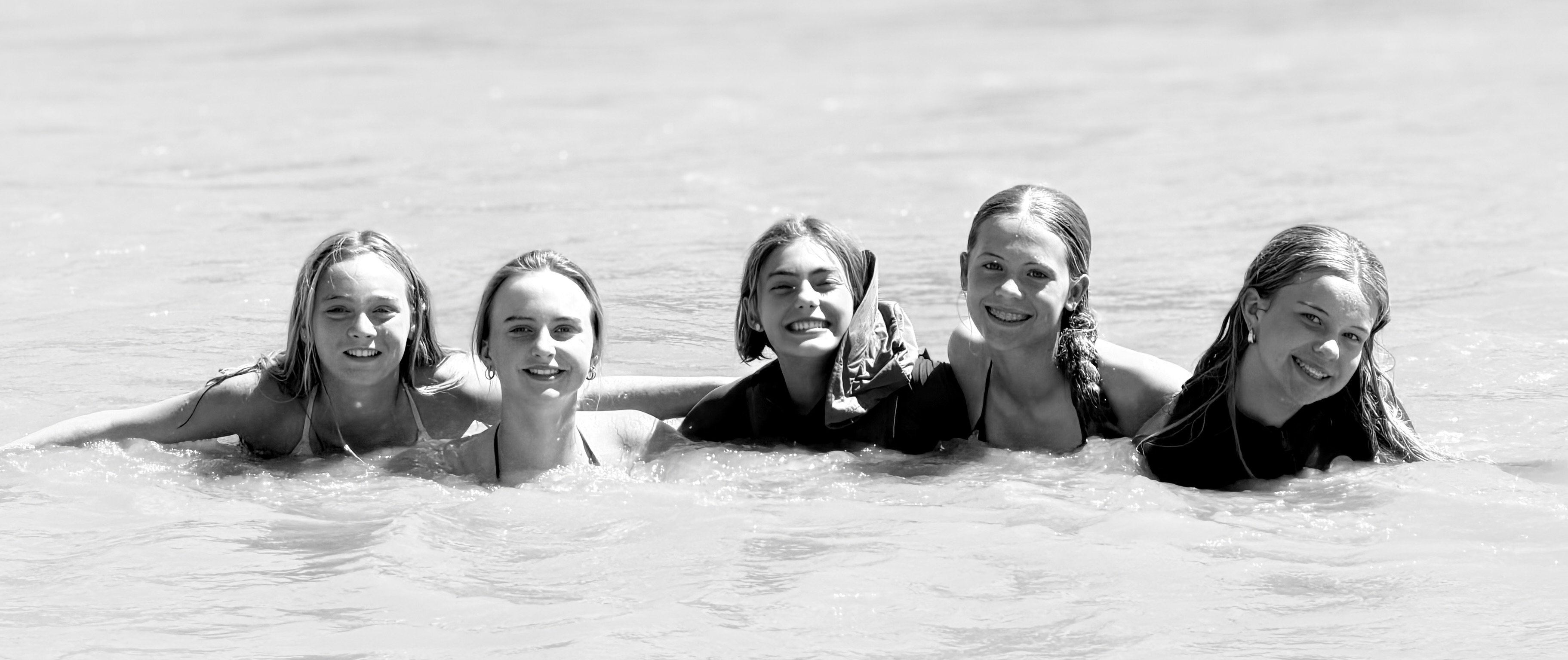Five teenage children on the Orange River having fun